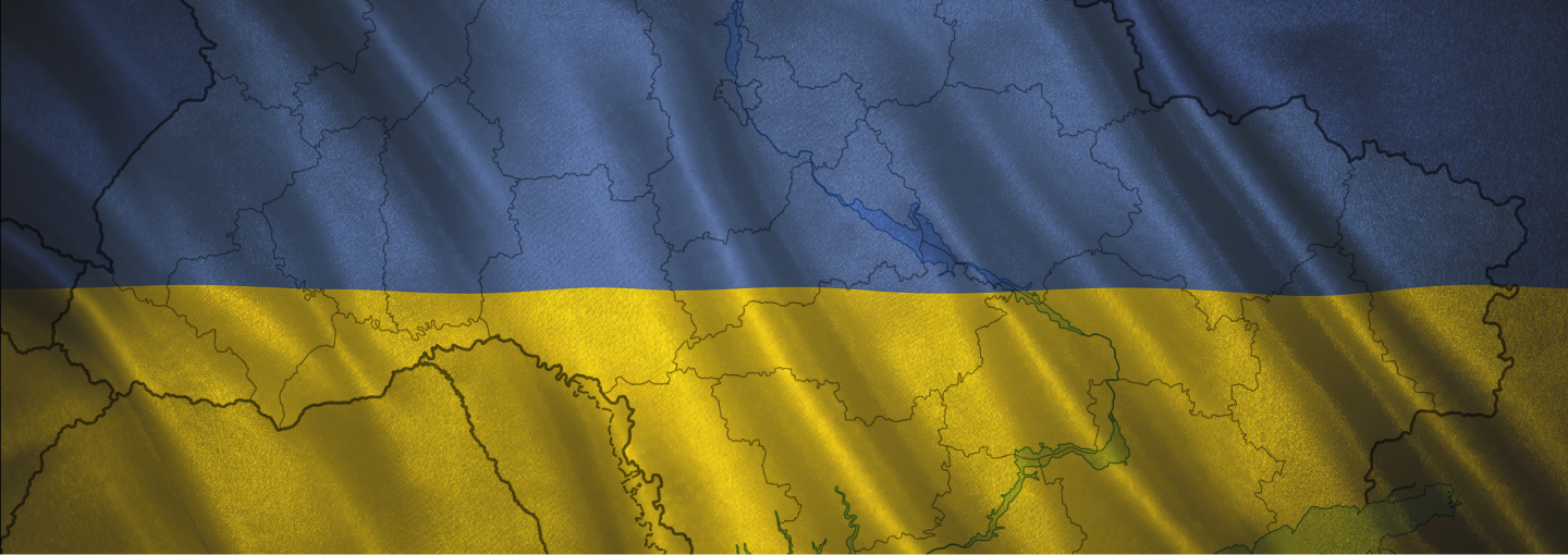 Ukraine Under Siege: What's Next Image - outline of Ukraine against backdrop of Ukrainian flag colors